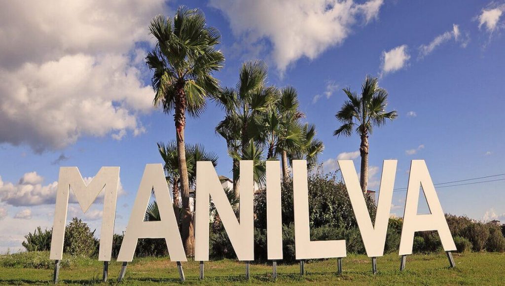 Manilva sign at the entrance of the town